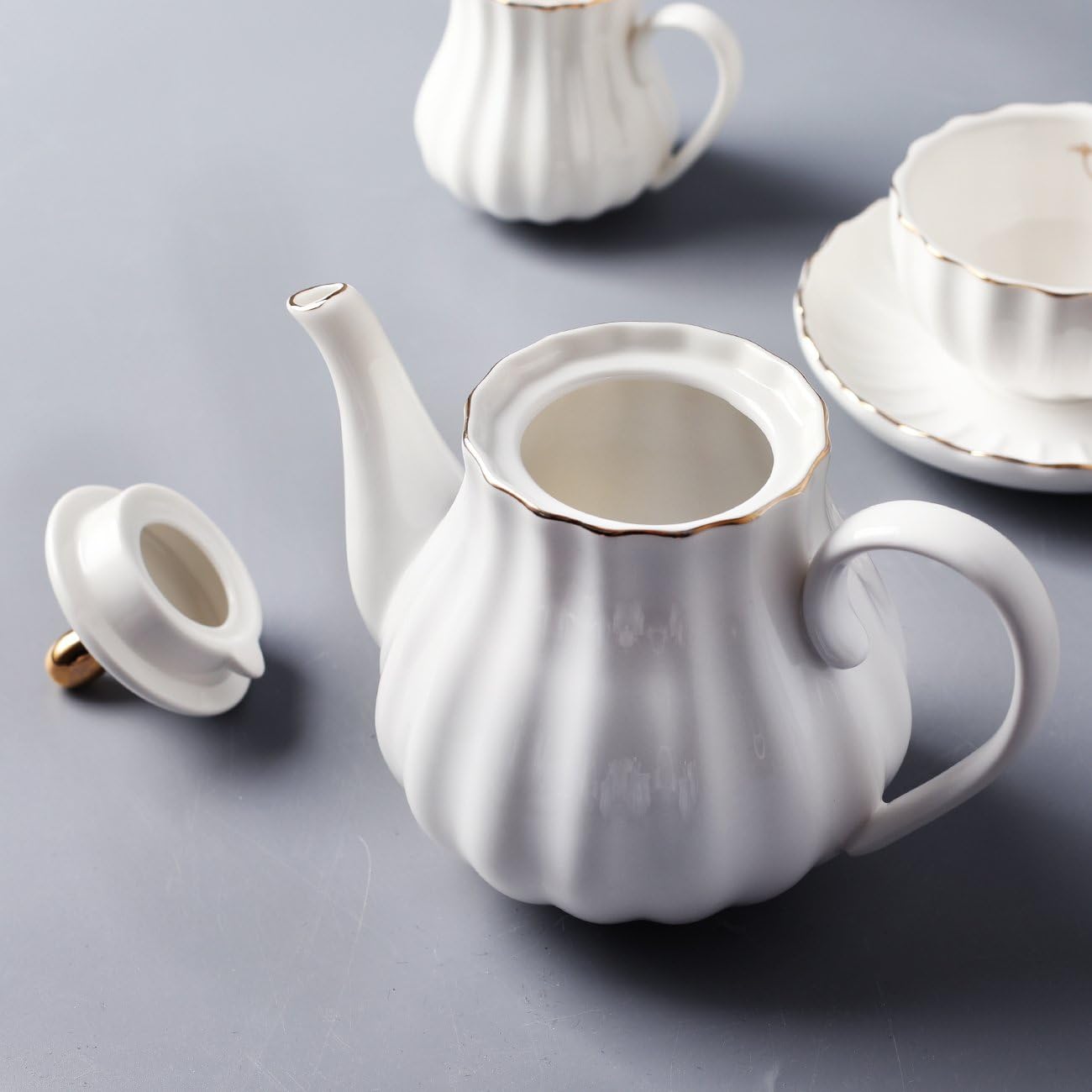 20-Piece Porcelain Tea Set with Teapot, Cups, Saucers, Sugar Bowl, Creamer and Metal Stand